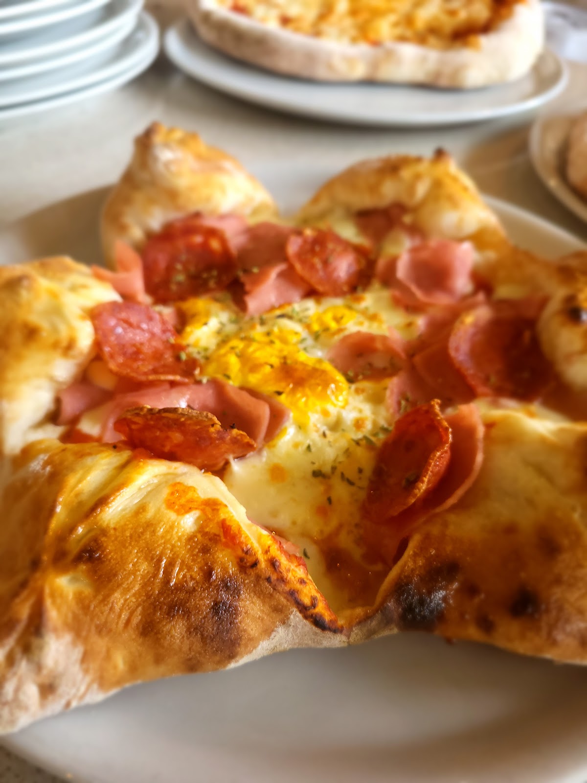 Detalle de la Pizza Estrella